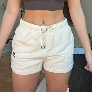 cream nike shorts
